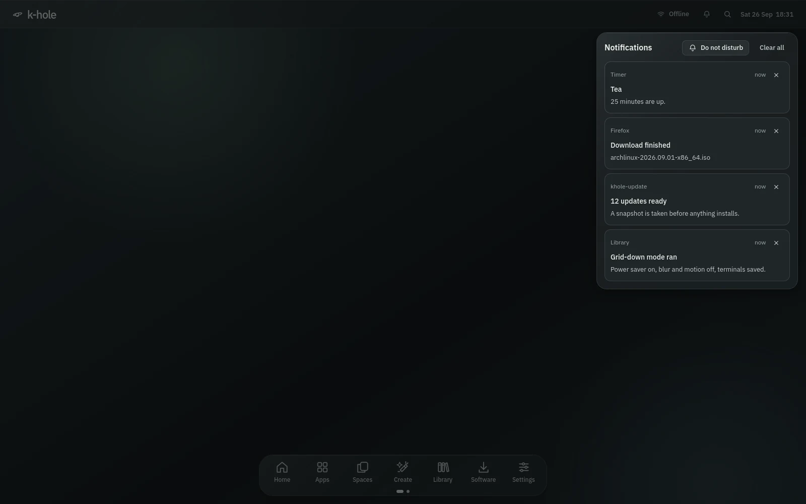 The notification history: a finished tea timer, a Firefox download, 12 updates ready, and a Grid-down mode run, with Do not disturb and Clear all.
